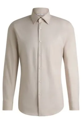 Camisa slim fit en sarga de algodón elástico de planchado fácil