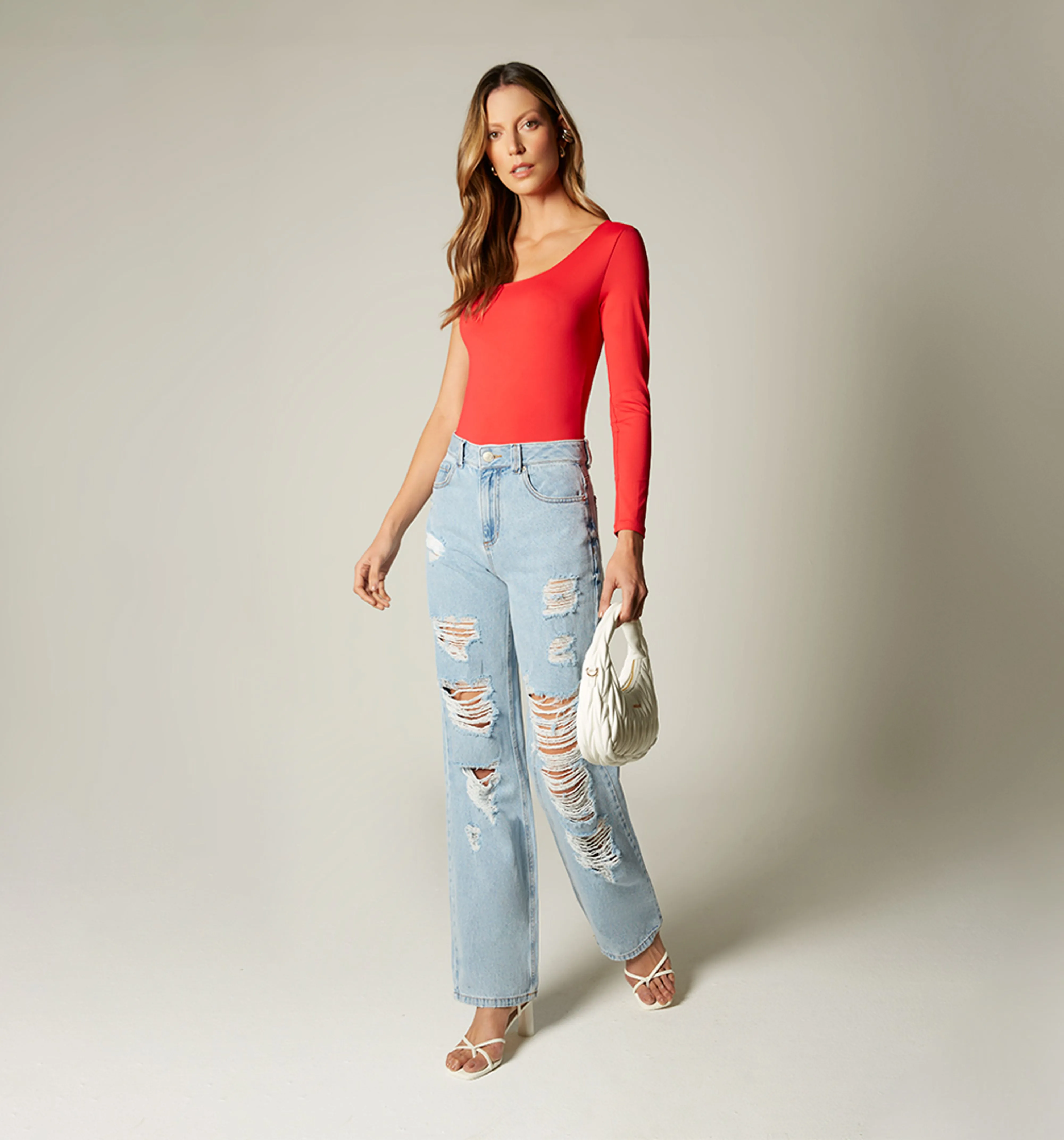 Jeans  metalizado con roto
