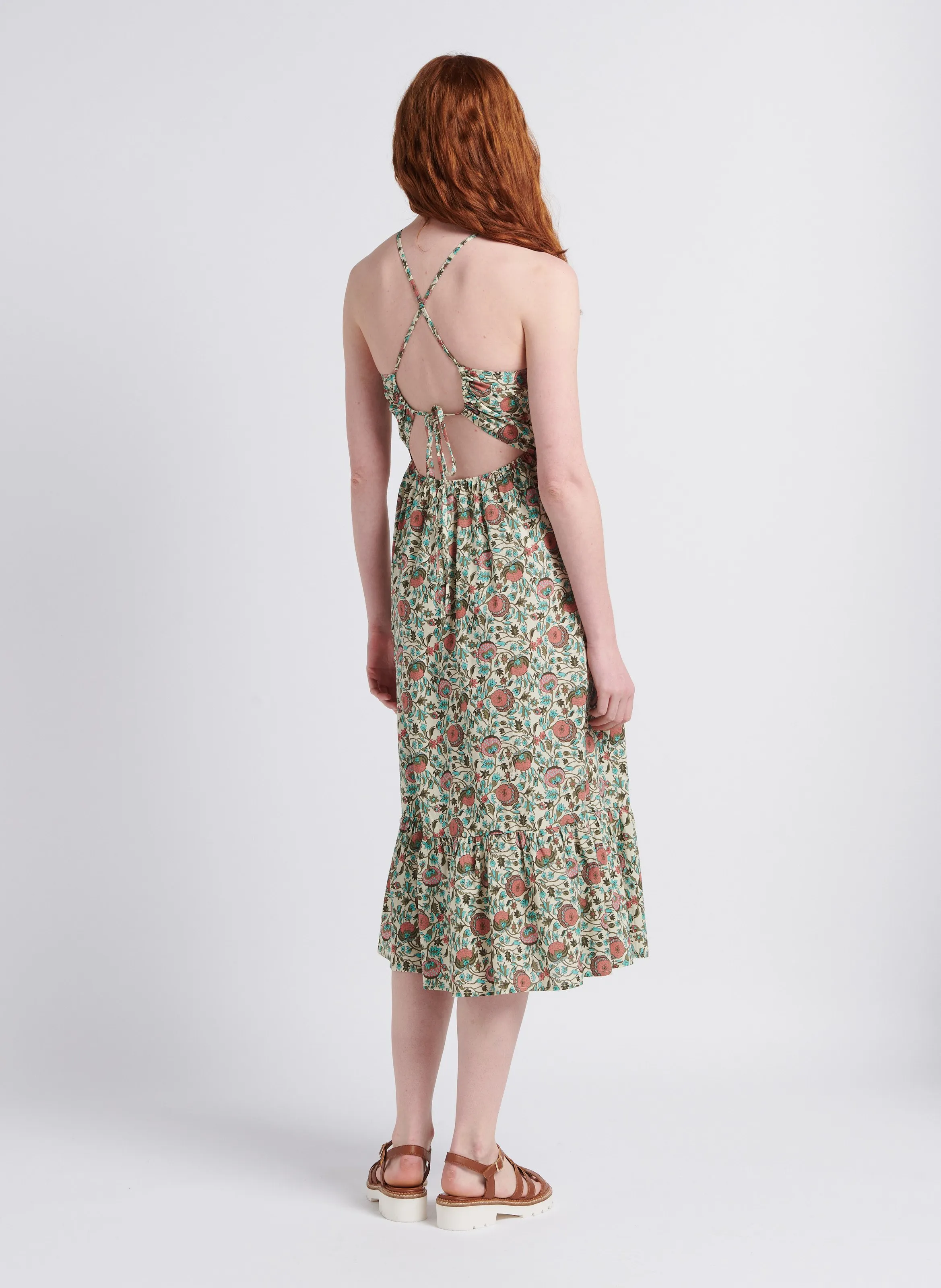 Vestido mini de algodón con espalda cruzada y estampado en blanco
