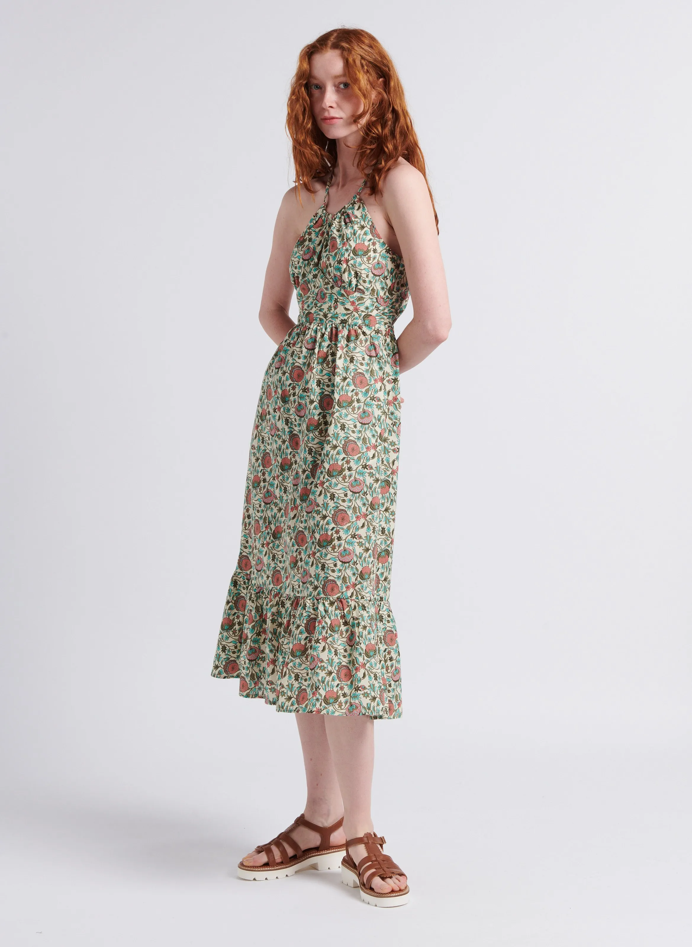 Vestido mini de algodón con espalda cruzada y estampado en blanco